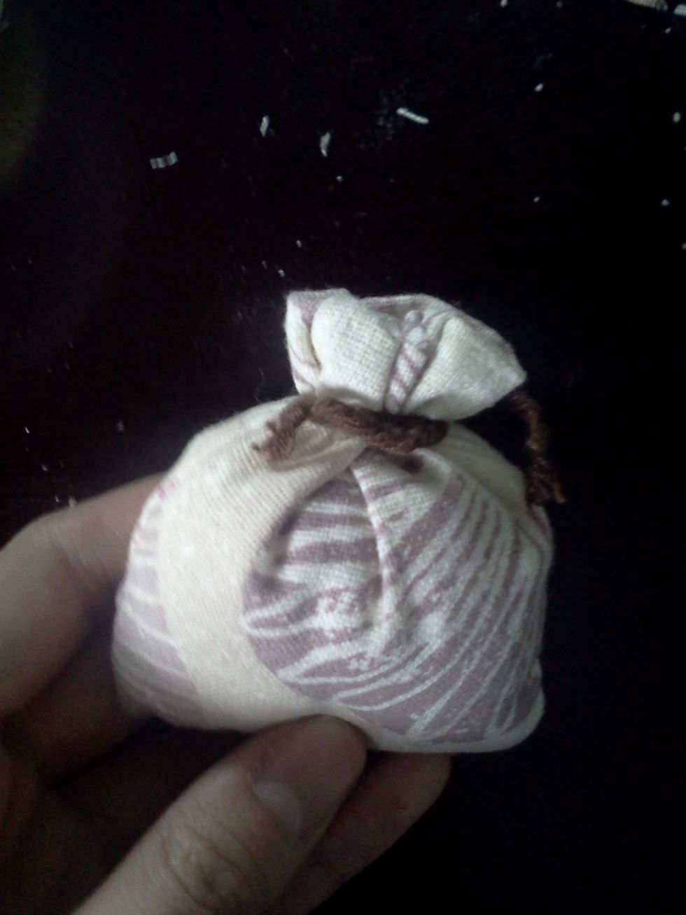 I made this a long time ago, its bigger and with cuter fabric. You can put it anywhere (purse, drawer, etc) or give it to people. I put it in my purse. Its cute and smells great.