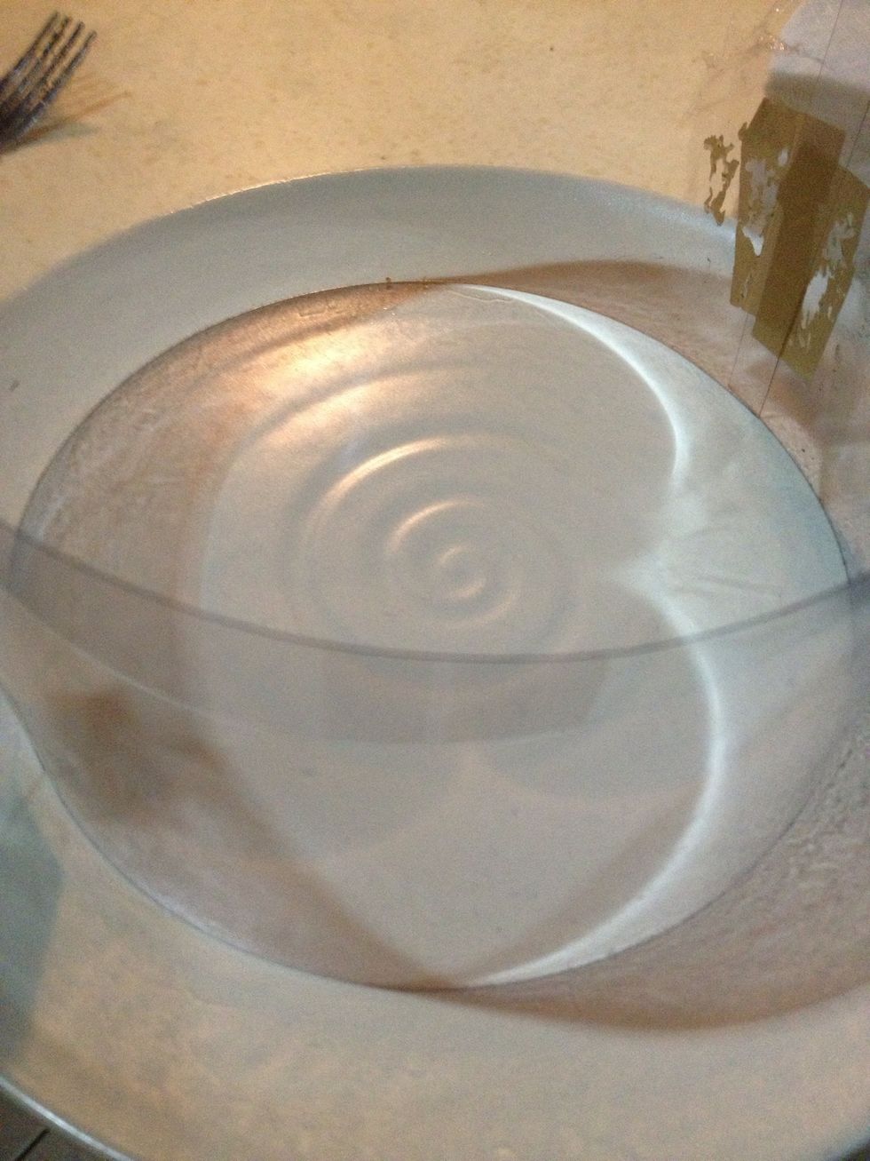 I make a guide by cutting a sheet of transparent paper in half and taping them to make a circular ring