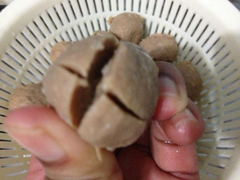 I make a small cut in the center of the meatball, so it will look more nice in a bowl :)