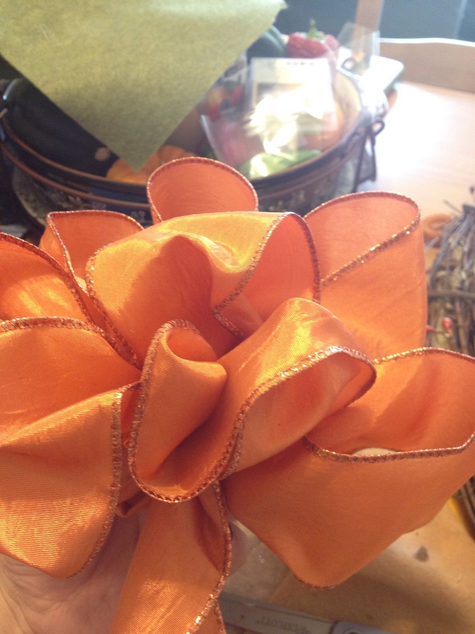 I make two smaller loops in the middle... And yes... Glue!!!