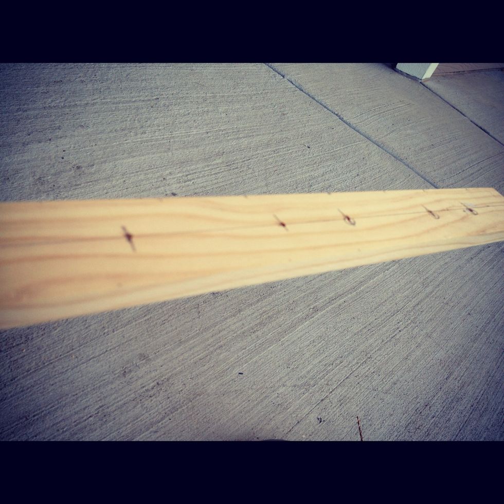 I marked the back of my stick, so it wouldn't show. Leave two inch space on either end. For supports you should have 1.5" space to ensure the glass holds and 2.5" spacing between two supports