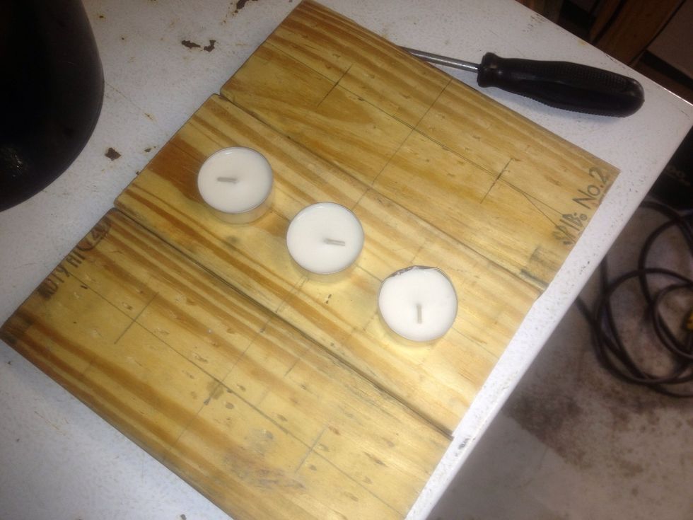 I marked the center of the board, then the location of where I wanted to drill the holes