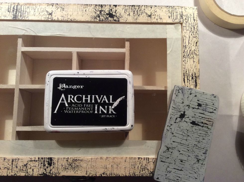 I masked off around the glass to protect it then using Andy Skinner Industrial Set Stamps I stamped all over the entire box and inside using Archival Ink.