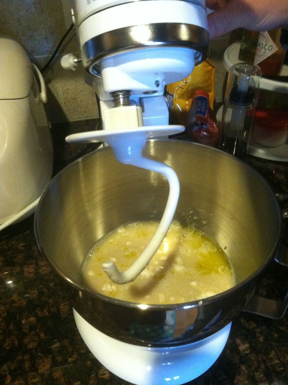 I measure out the flour on a scale first (300 grams). Add flour, proofed yeast, salt and olive oil in mixer.