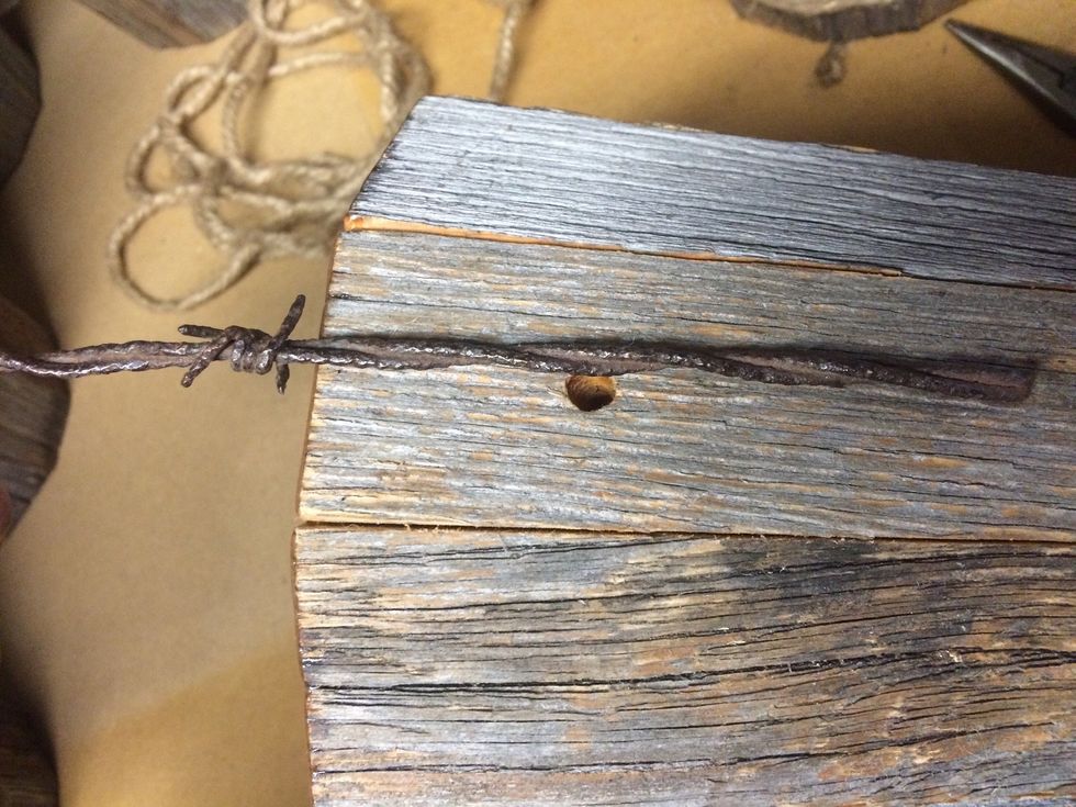 I measure the bend in the wire by placing a barb just on the top of the bucket.