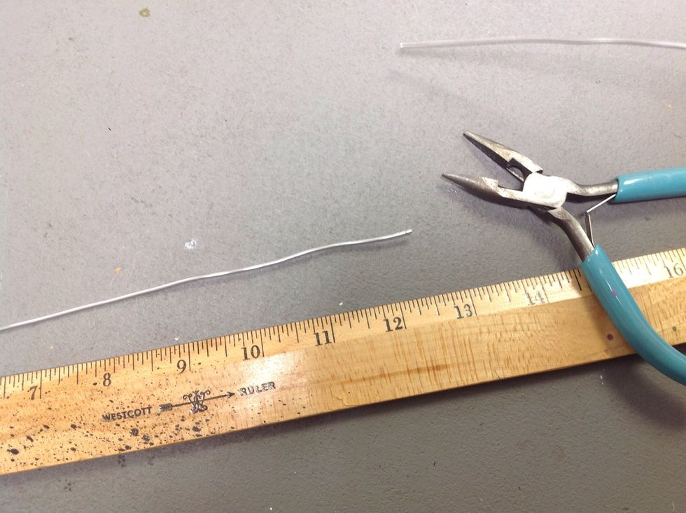 I measured a foot of wire to make a birdcage roughly 5 inches tall.