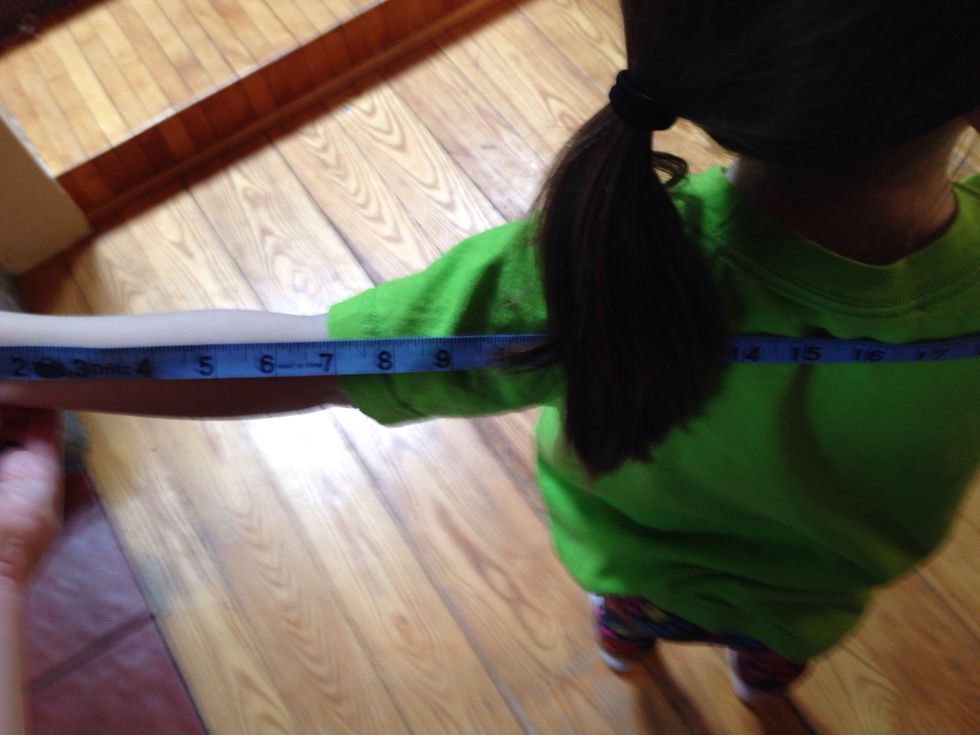 I measured my daughter from wrist to wrist then divided by 2.