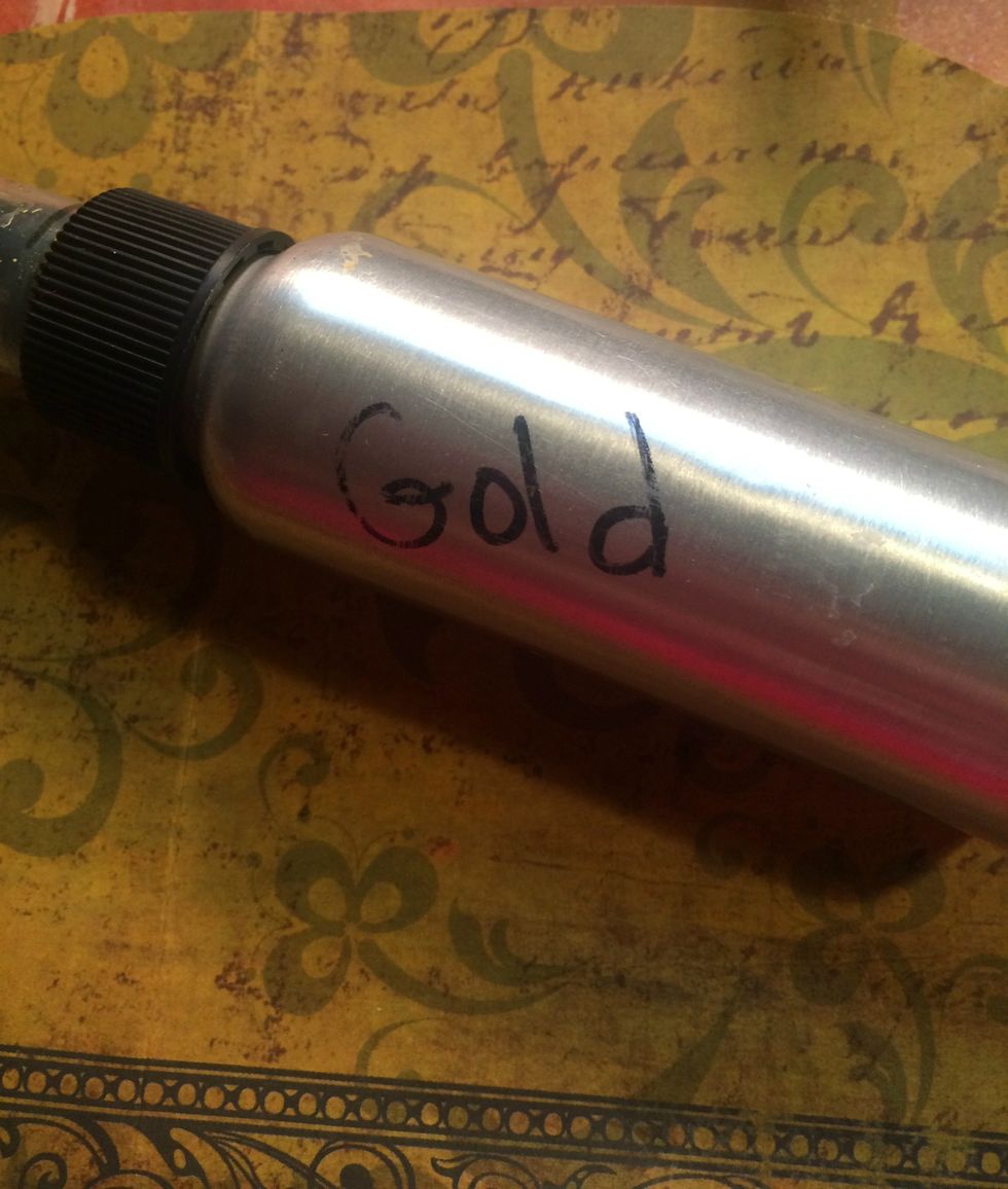I misted the paper with Art Anthology Gold spray and it gave it such a beautiful gold sheen.