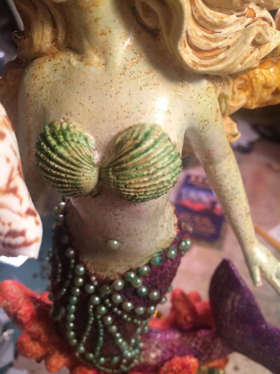 I misted the seashells on her breasts with Salted Caramel and brushed with Fiji also. I wiped away any excess misting on her body with a towel. I layered the colors until it was how I wanted it