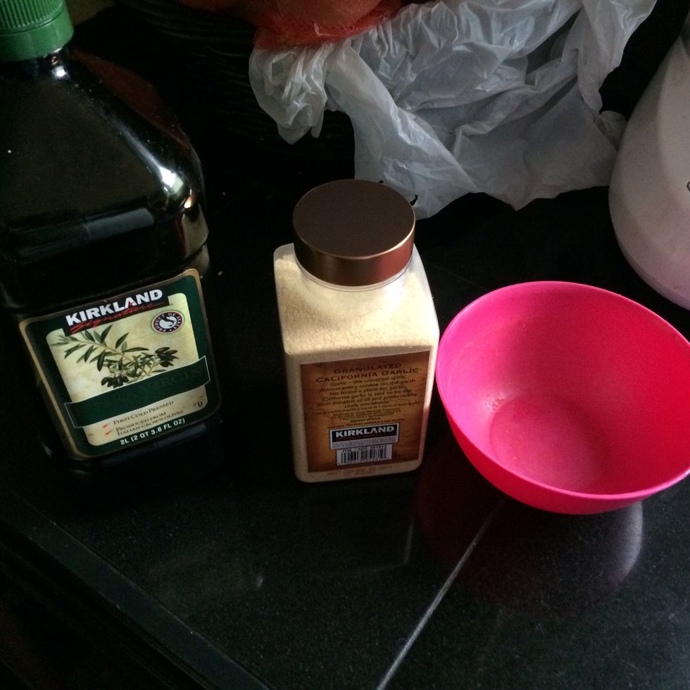 I mix the olive oil and garlic power together