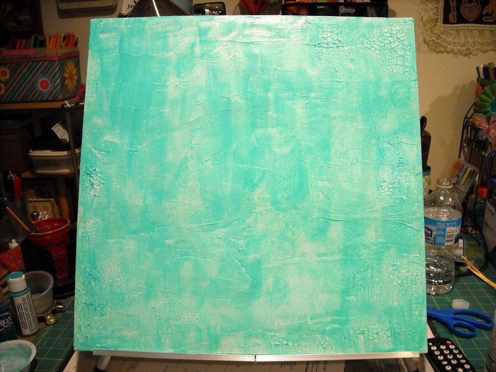 I mixed Deco Art light turquoise with Liquitex matte fluid medium so the coat was uneven and gave the piece a great first layer of texture and color.