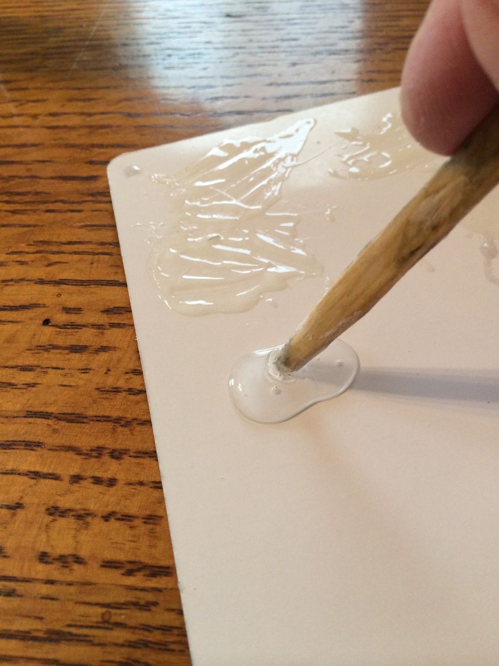 I mixed together a very modest amount of the two-part 5 minute epoxy glue.