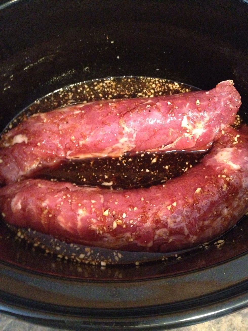 I moved the tenderloins around to coat them with the teriyaki sauce.