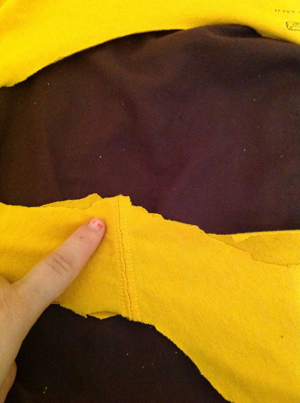I not like that edge that sticks out so just cut it off to match the other part of the sleeve