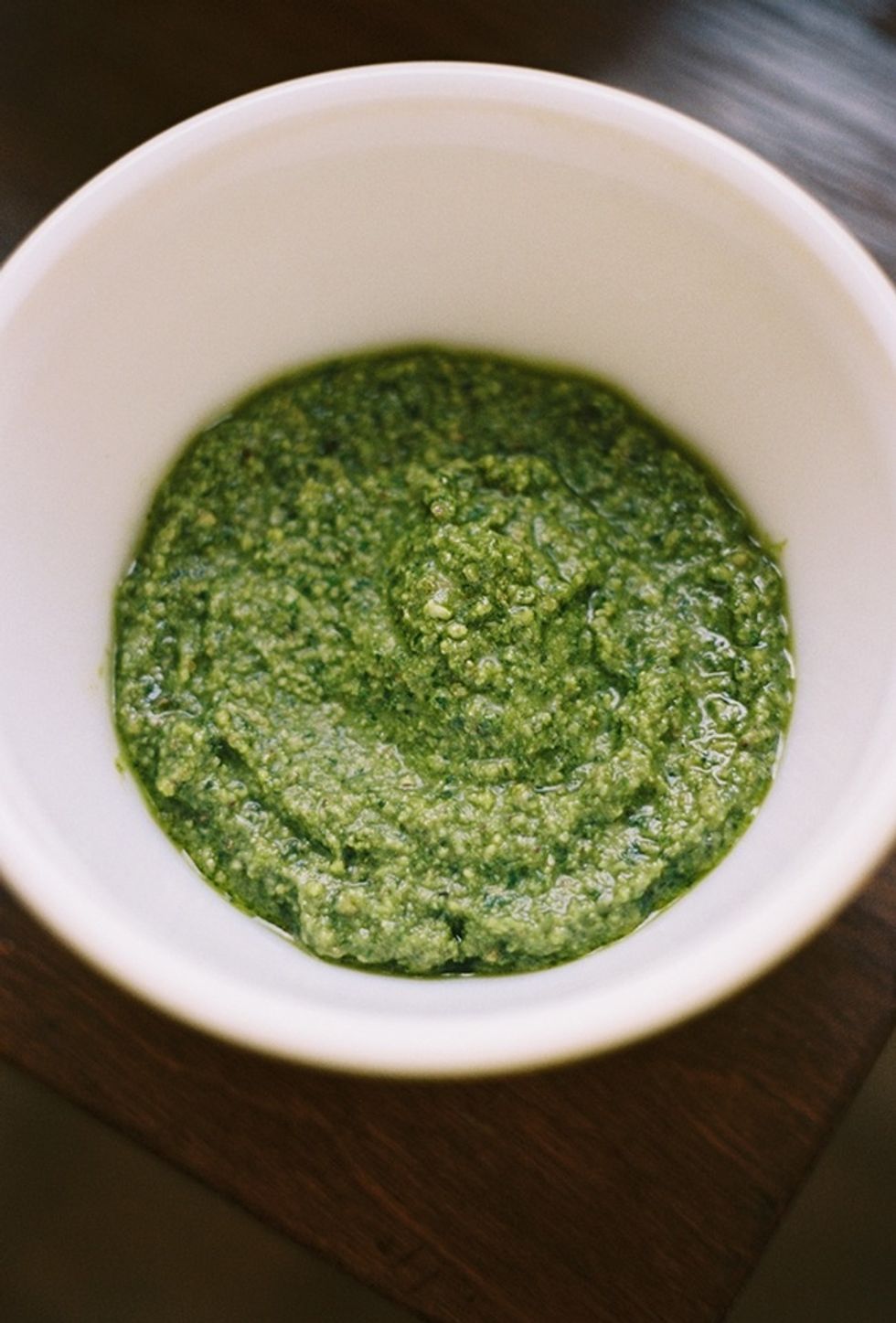 I omit adding Parmesan cheese but if you want to add it , blend 1/2 of fresh Parmesan cheese along with the other ingredients.