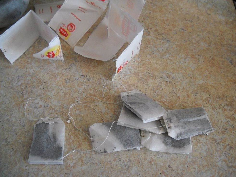 I open all the tea bags and pull the string and bag away from the paper (leave the string on the bag. It's ok if the tag is on or off the string).