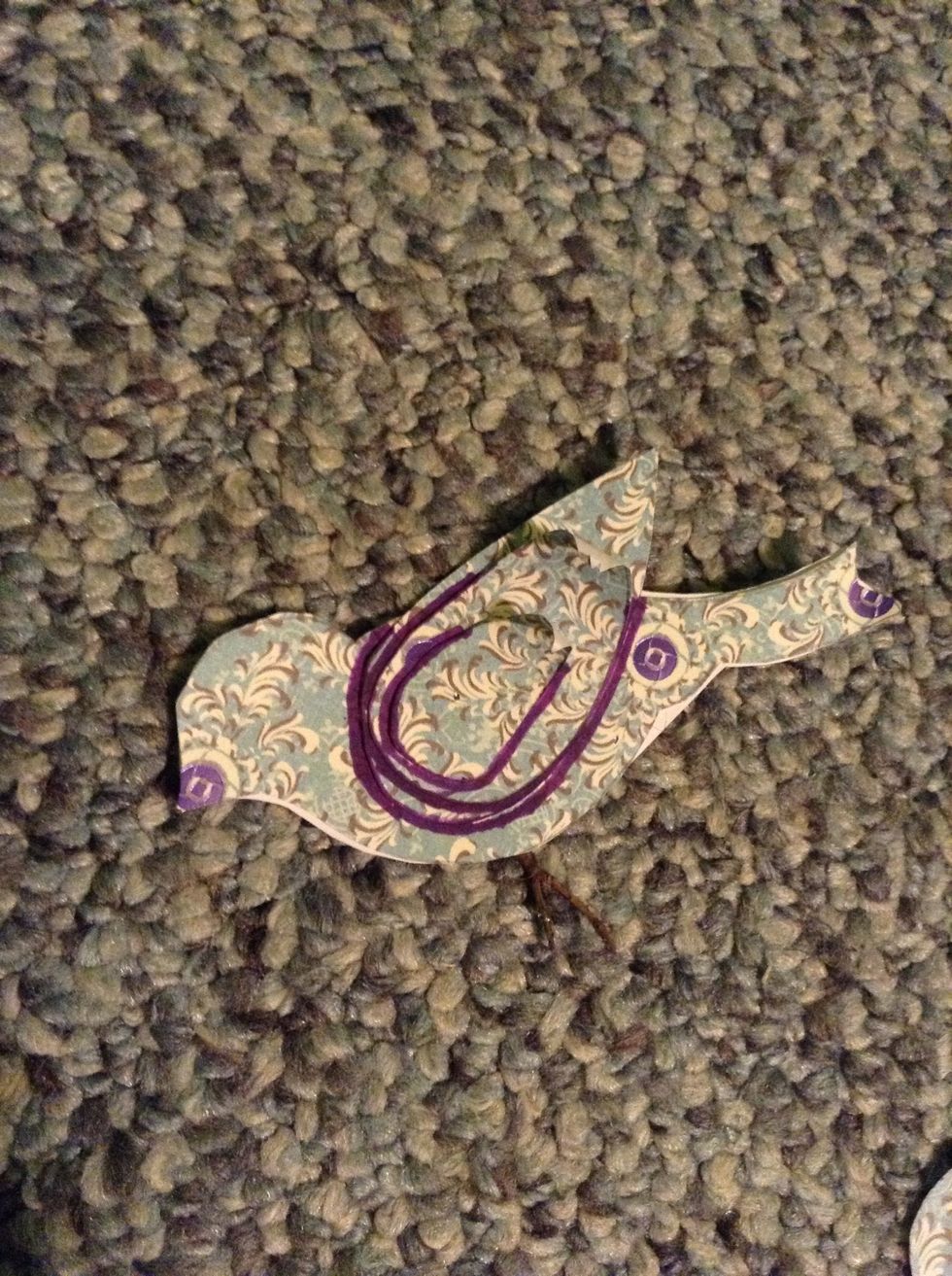 I outlined the wings so you can see them better.