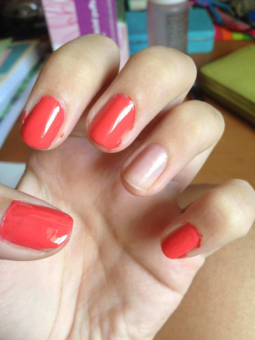 I painted a second coat after about 10 seconds. You don't need to wait till its completely dry, as long as the surface is generally dry. I test this by tapping my finger lightly against the nail.