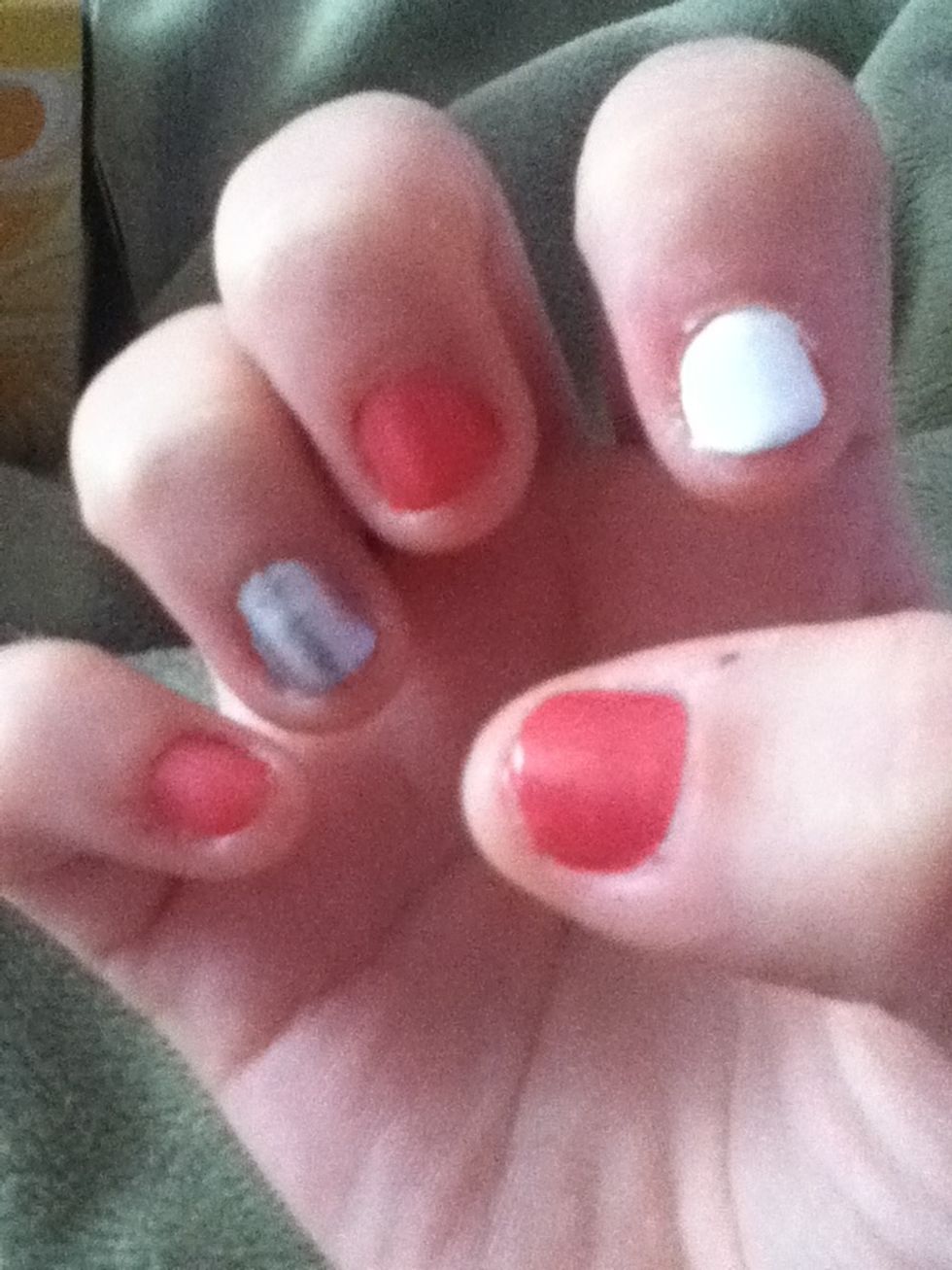 I painted my nails 3 pink 1 silver 1 white.
