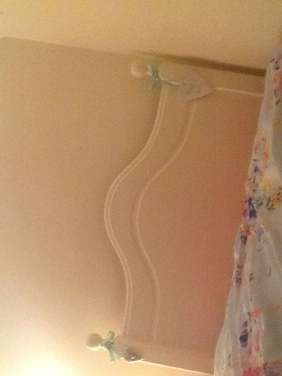 I painted my pine (ugh) bed cream to match the freshly reprinted walls