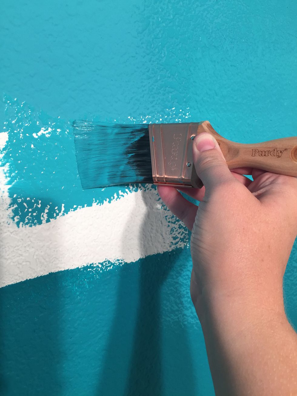 I painted the blank section between the two colors with my new paint mixture, overlapping the top and bottom colors slightly. I painted only about a 2 or 3 foot section at a time.