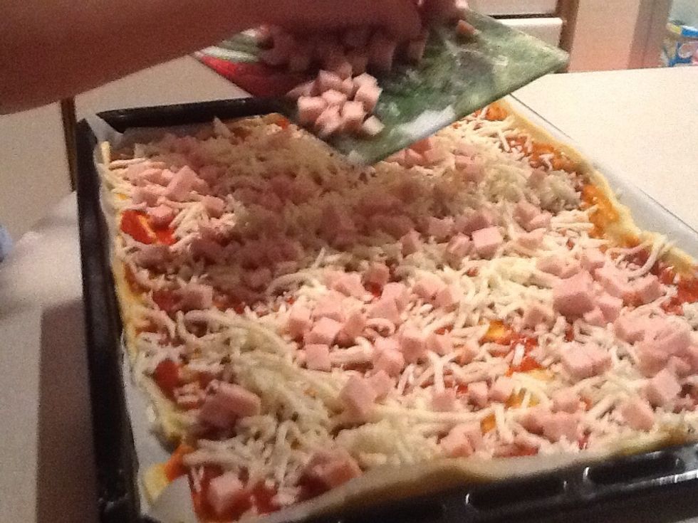 I per acabar li posem a sobre de la pizza