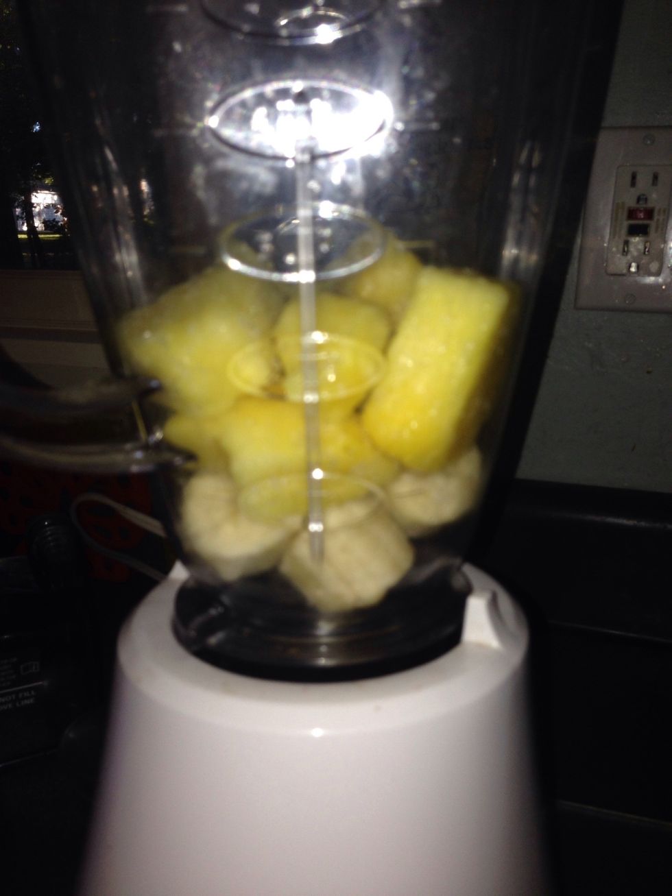 I picked one cup of frozen pineapple... I was feeling tropical.  This goes with your frozen banana.  You can pick any fruit you want.