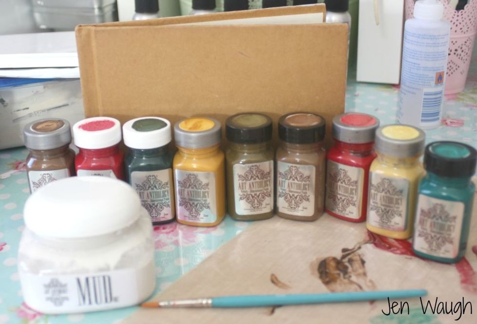 I picked up a vintage book from the charity store to alter. You will also need a selection of Art anthology paints and Mudd.