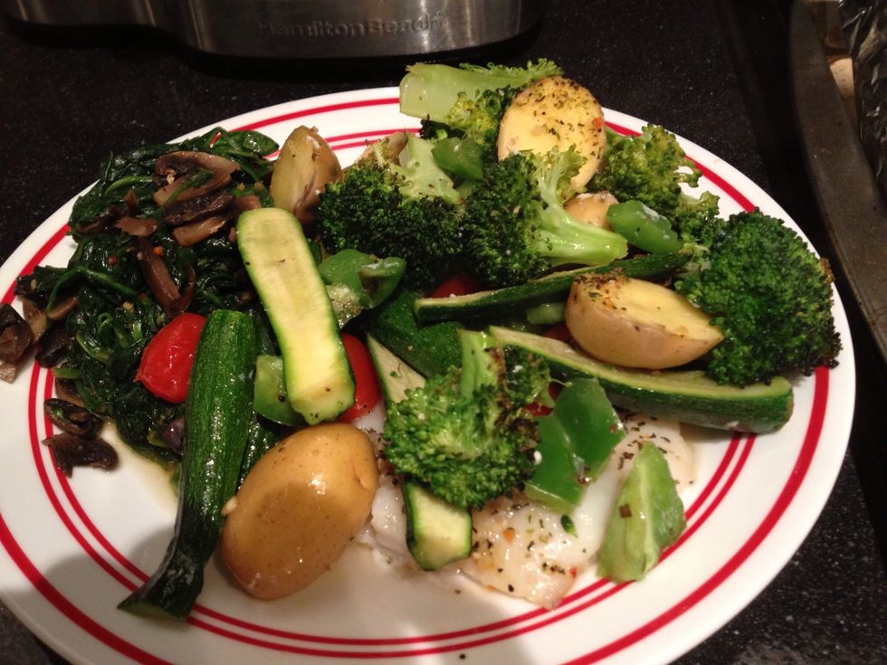 I piled it all on a plate here. You can serve with rice instead of spinach, but I had to get rid of some spinach before it went bad!
