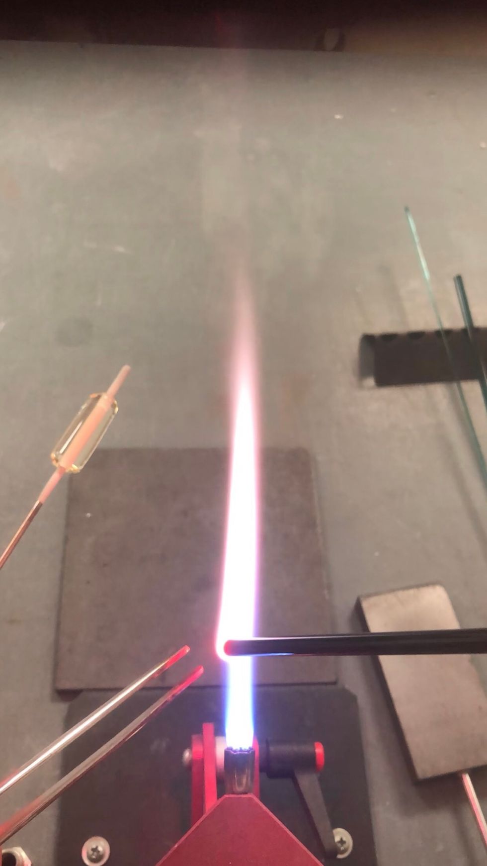 I pinch the tips off of new rods to avoid contaminants and bubbles. Good thing I have three hands.