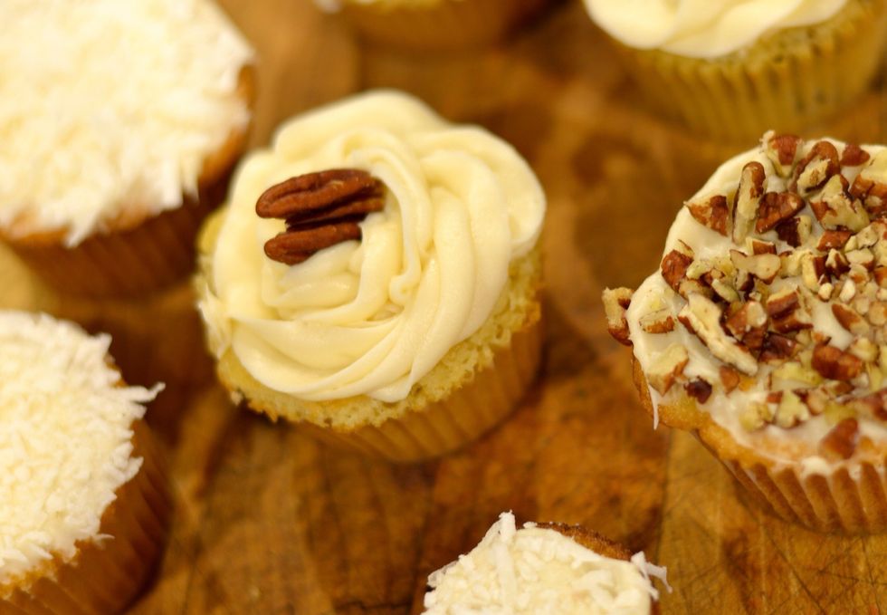 I piped some frosting on my cupcakes.. And put a little pecan on top! Easy peasy!