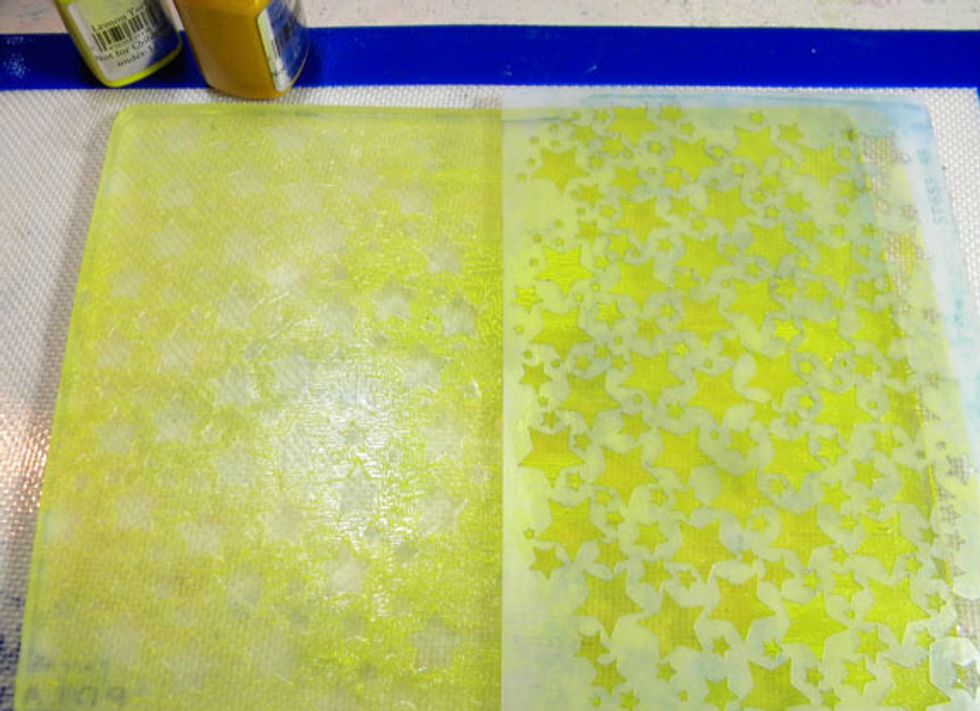 I placed the stencil on the other side of the plate and left it in place when I printed the paper.