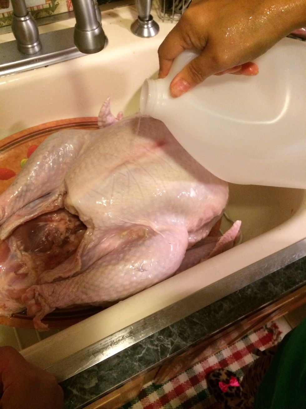 I pour vinegar inside and outside of my turkey and wash it well. After i clean it with vinegar i give it a good rinse with water