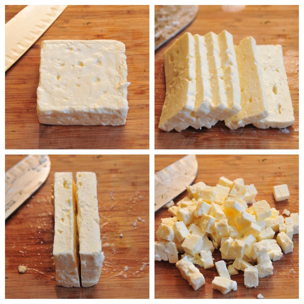 I prefer buying a block of feta with some of its liquid still in it.  It just seems to taste better than the kind you can buy crumbled.  Dice the feta, like above in the picture, then add to the bowl.