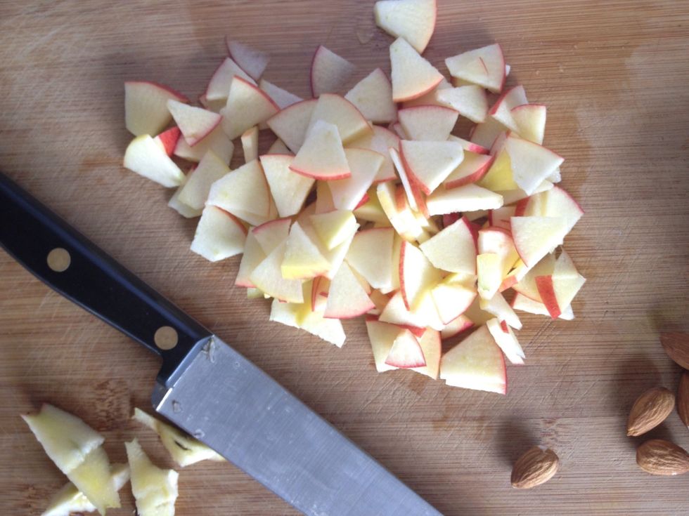 I prefer my apples to be finely chopped. Simply slice the apple into quarters, then slice the quarters in half and finely chop.
