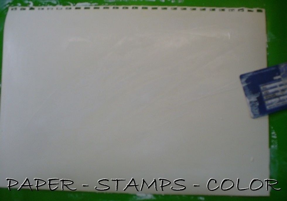 I prepared the page with gesso, by scraping it onto the surface with an "old creditcard". No need to dry the gesso.