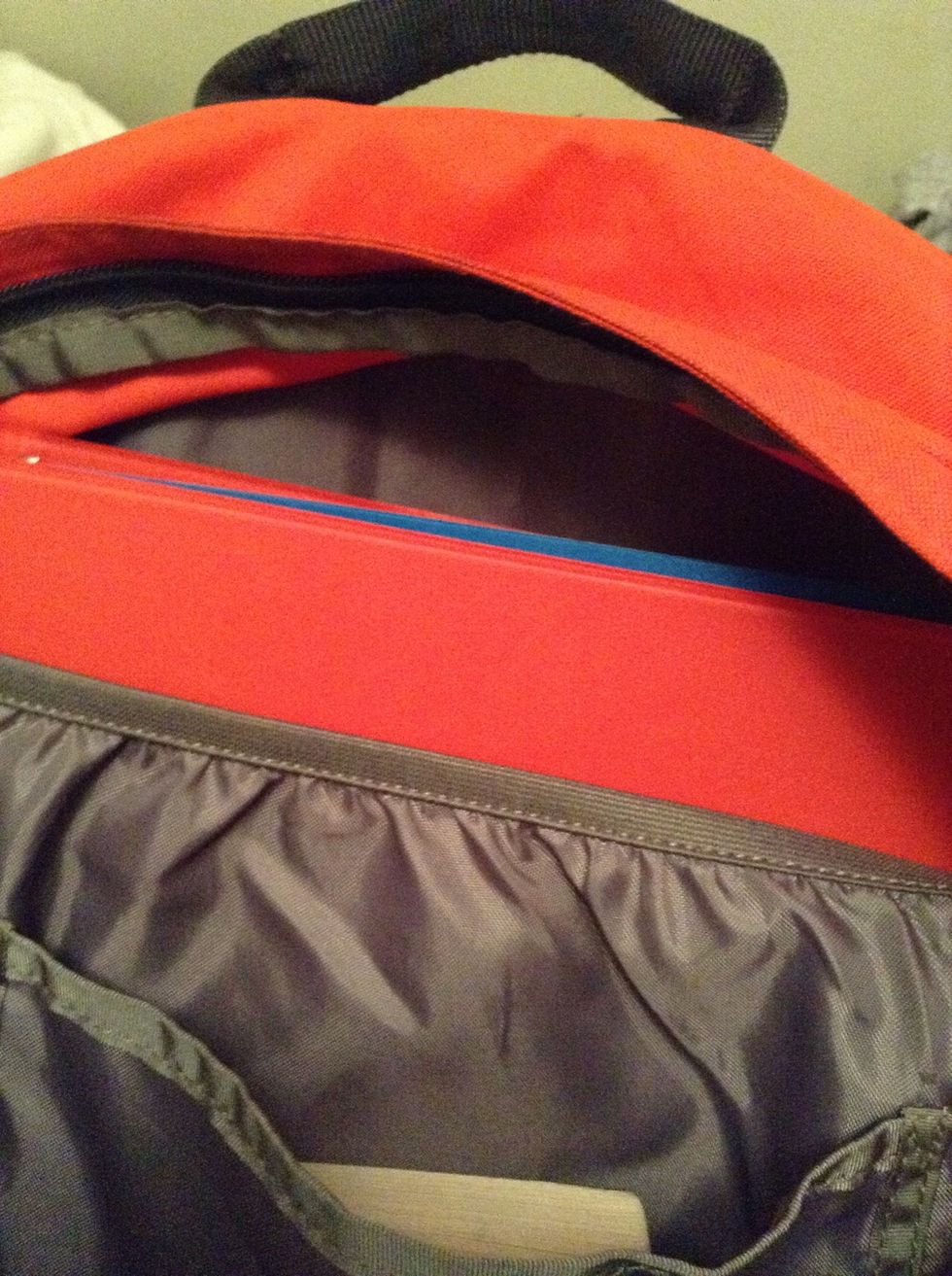 I put it in the big pocket so it wouldn't take up so much room!