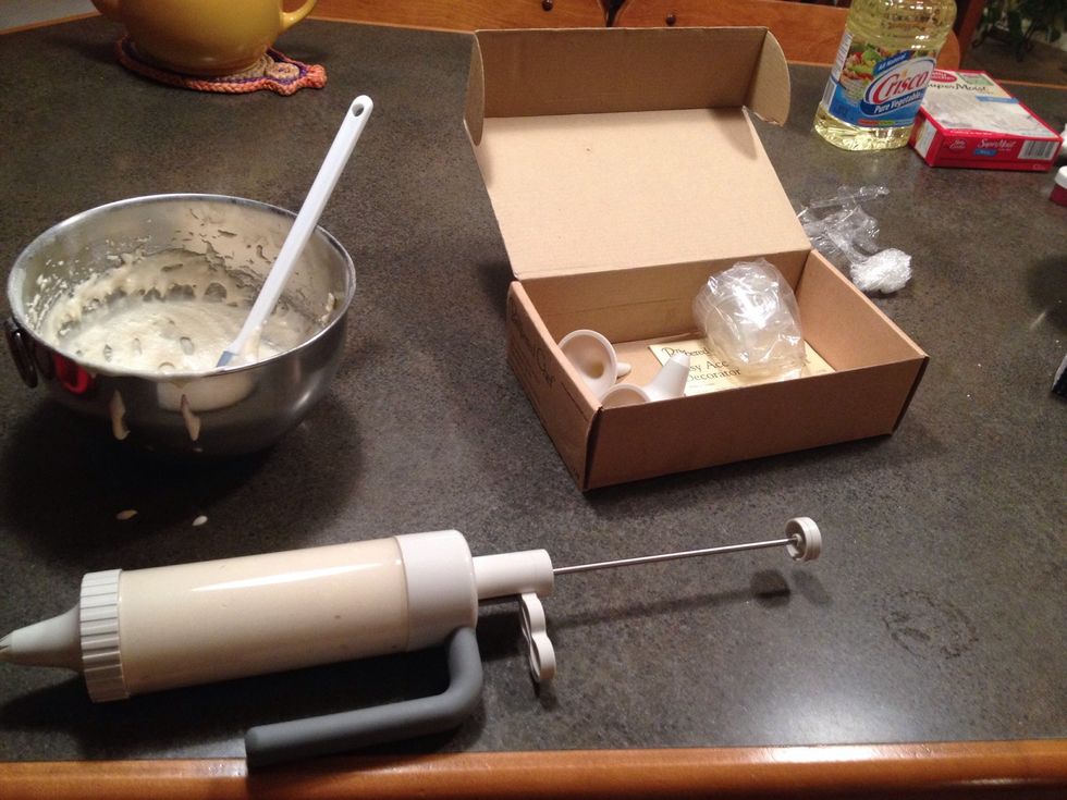 I put it into this container so it would be easier to spread on the cupcakes or you could just use a knife. You will ice your cupcakes.