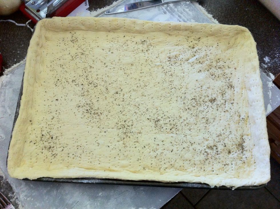 I put mine in the oven at 400 degrees F for 5 minutes - I didn't want a soggy crust after adding toppings. But this is optional