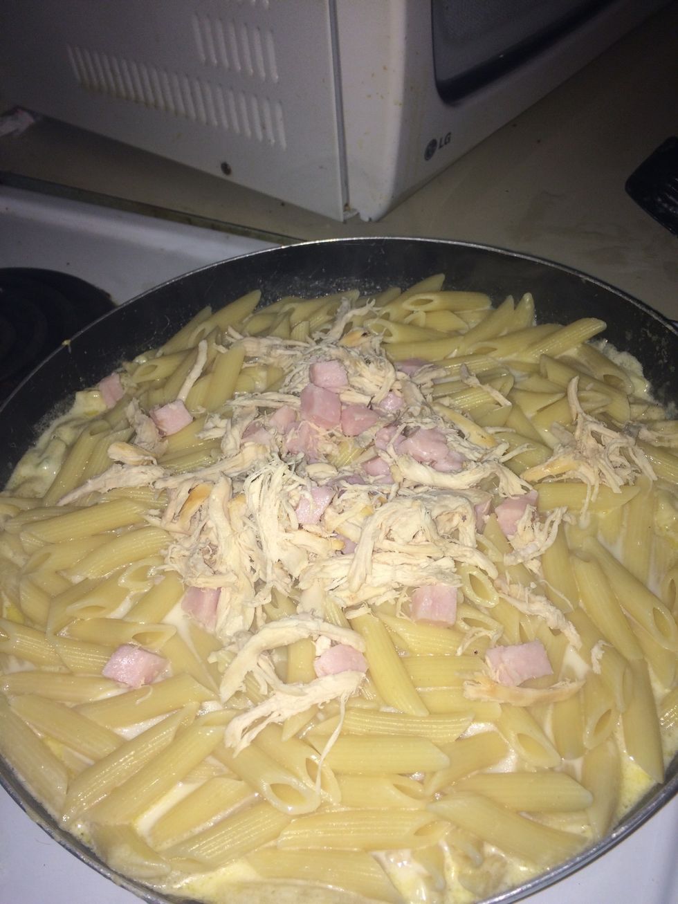 I put the Rotisserie chicken, turkey, cheese and ham in the pan so they could all cook together