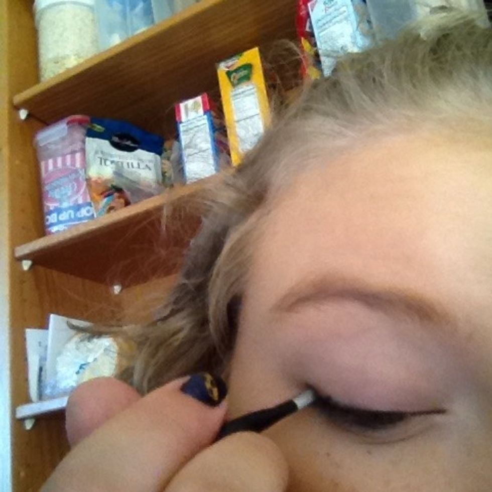 I ran out of liquid so I used water and black eyeshadow and applied to my lash line