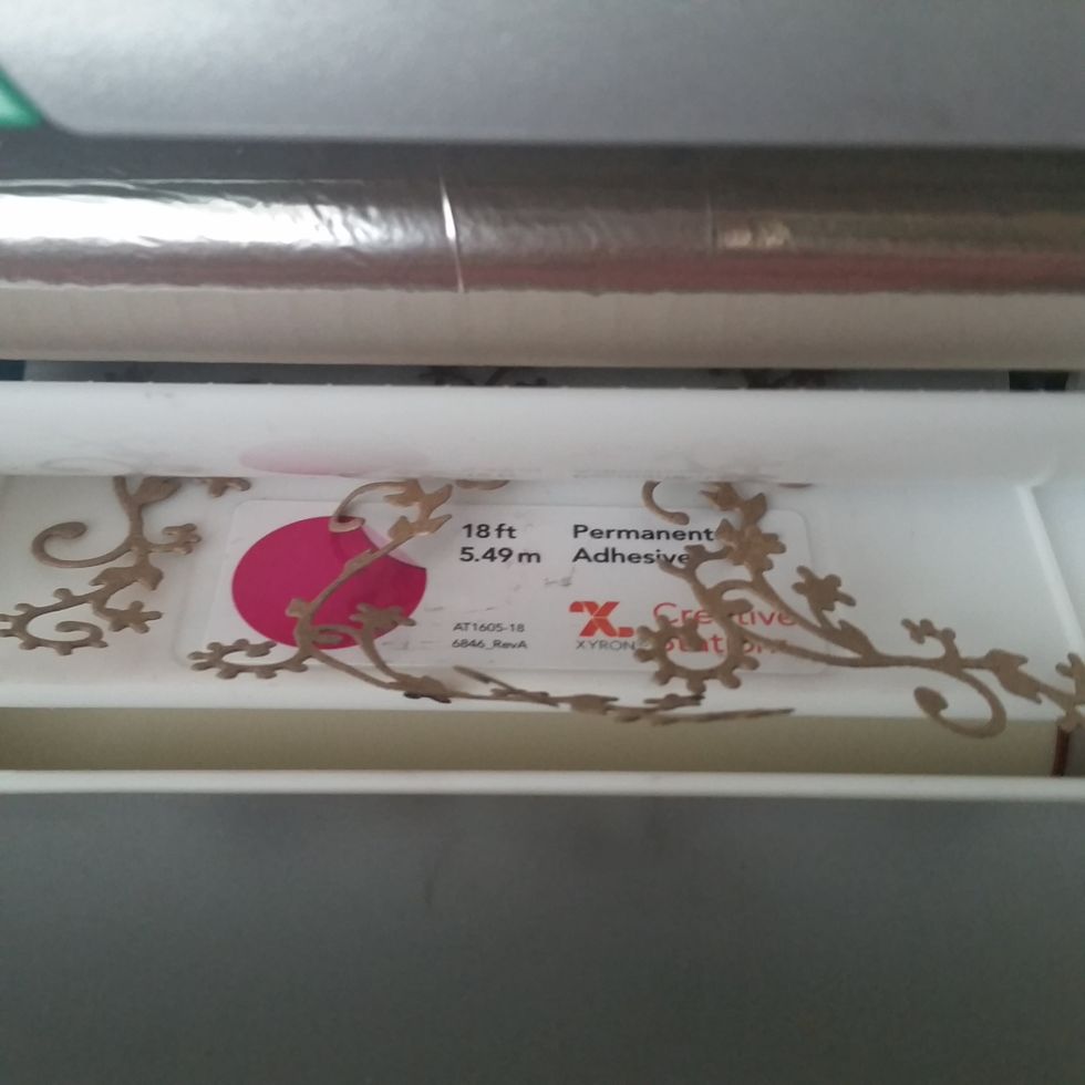 I ran them all the Floral Corner shapes through the Xyron Creative Station with the 5" Permanent Adhesive.