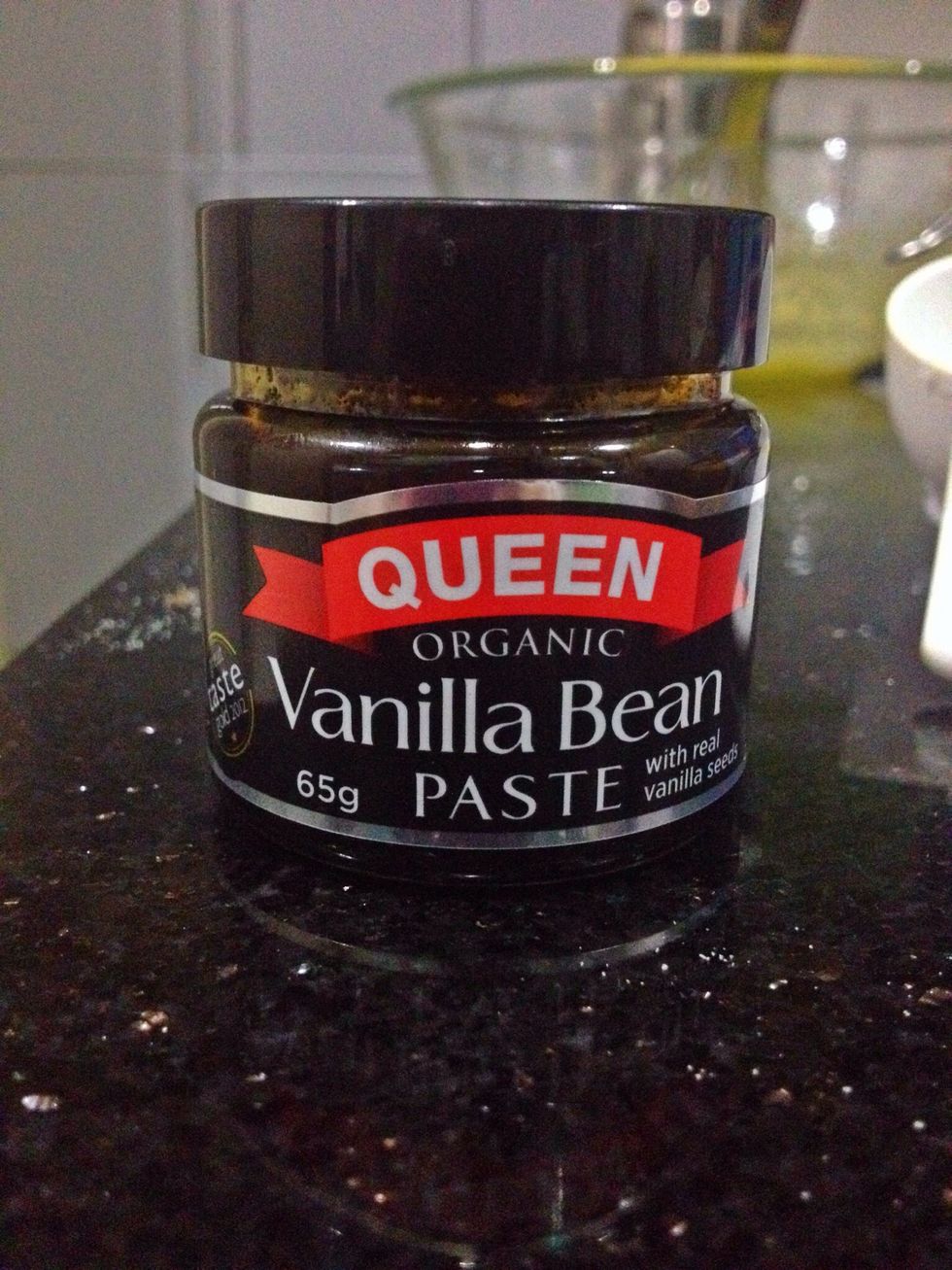 I recently bought vanilla bean paste and fell in love with it. It is pricey here where I live but definitely worth it... I recommend buying vanilla paste but vanilla extract will suffice. :)