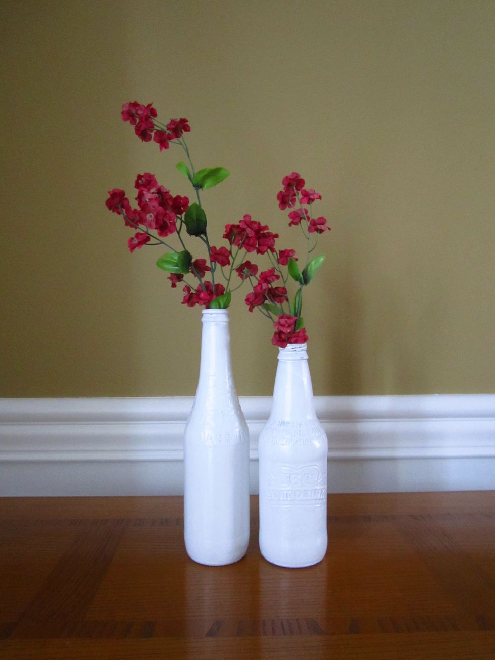 I recommend spray painting different bottle sizes, and experimenting with what you like the best. I really liked this look, with one bottle bigger, and the other smaller.