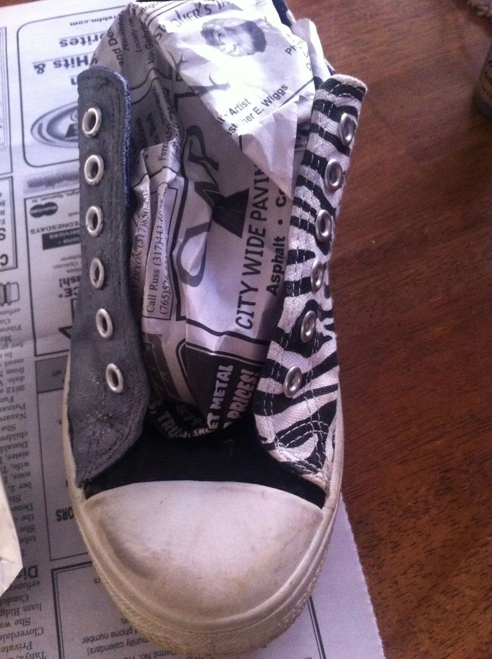 I removed the laces an stuffed with newspaper