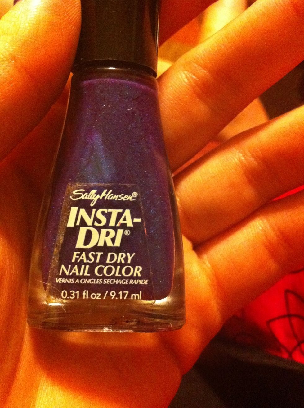 I repeated the plastic>sponge>nail process again, this time using Sally Hansen Insta-Dri in "Going Grape." This color has a bit of glitter, unlike the previous colors.