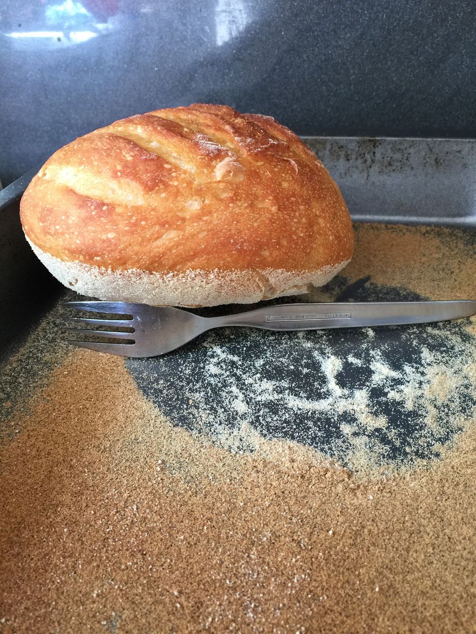 I rest the loaves on a fork, balanced on its side. This lets air circulate and stops the bottom getting soggy.