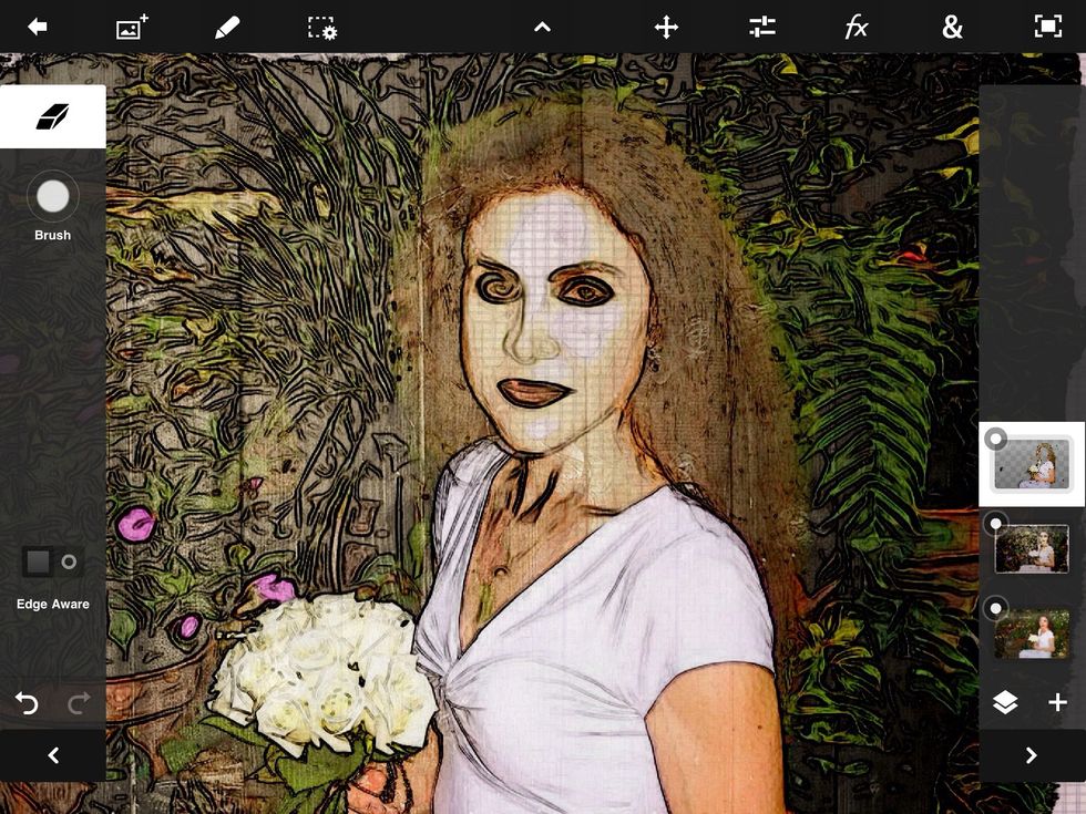 I returned to the top layer and erased the face and neck areas.