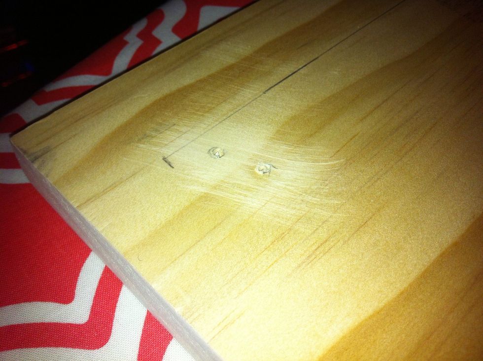 I sanded down the holes and sides of the wood that may have wood fibers sticking out. This ensures a smooth surface when painting.