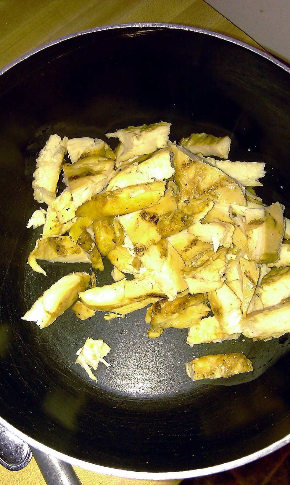 I saut\u00e9ed the chicken with fresh minced garlic until warm.